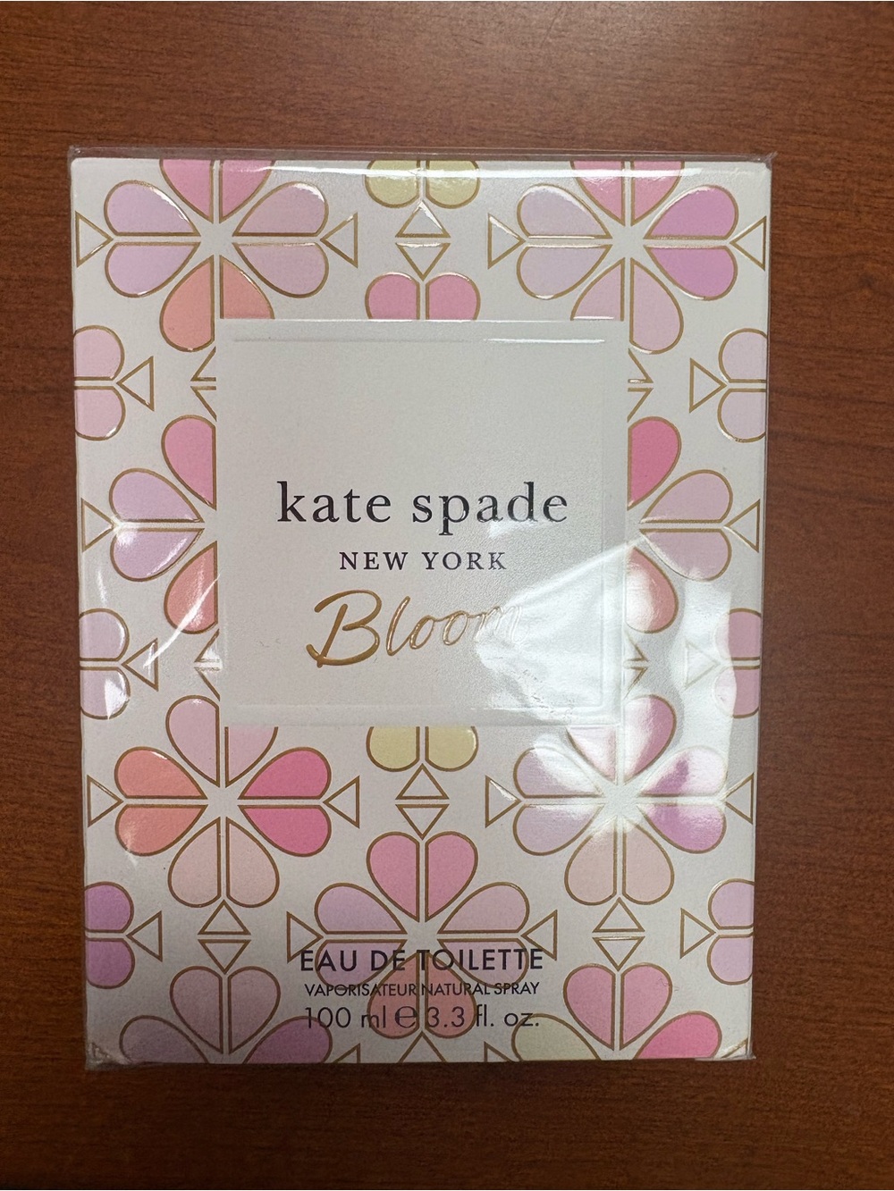 kate spade box with soft pink and white accents